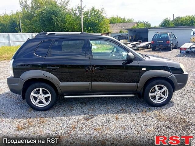 Хендай Туксон, объемом двигателя 2 л и пробегом 204 тыс. км за 7900 $, фото 3 на Automoto.ua