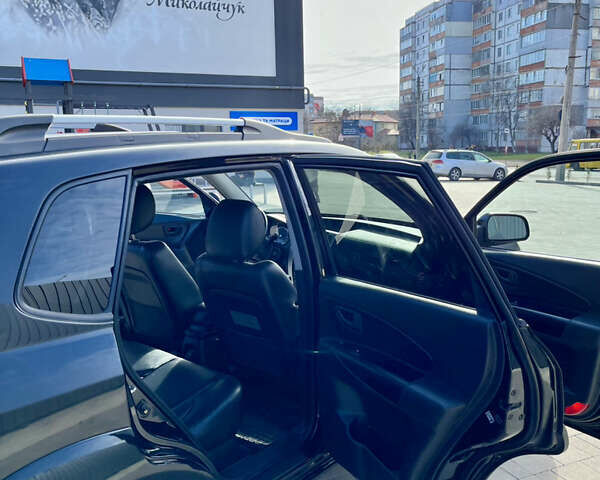 Хендай Туксон, об'ємом двигуна 2 л та пробігом 165 тис. км за 8000 $, фото 11 на Automoto.ua