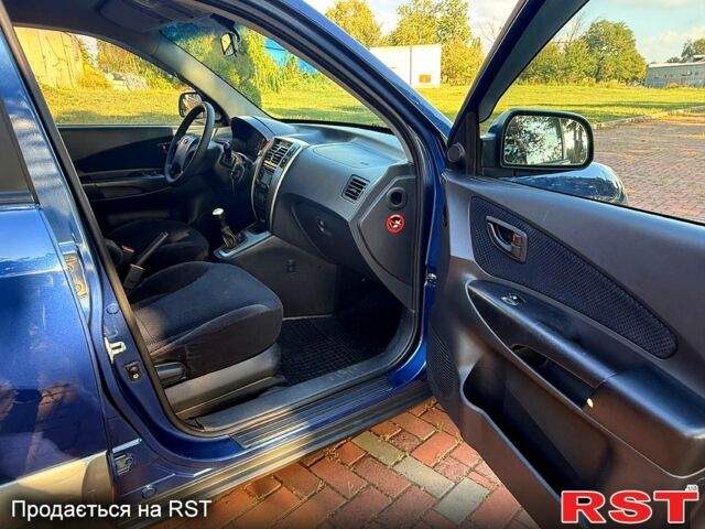 Хендай Туксон, об'ємом двигуна 2 л та пробігом 168 тис. км за 7500 $, фото 6 на Automoto.ua