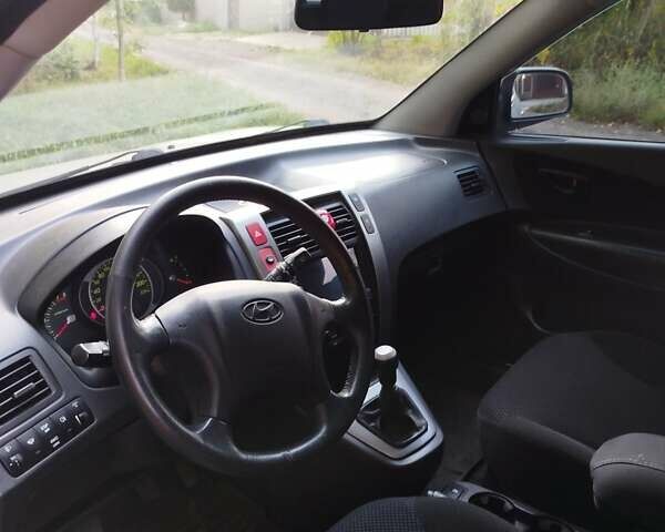 Хендай Туксон, объемом двигателя 2 л и пробегом 255 тыс. км за 7950 $, фото 7 на Automoto.ua
