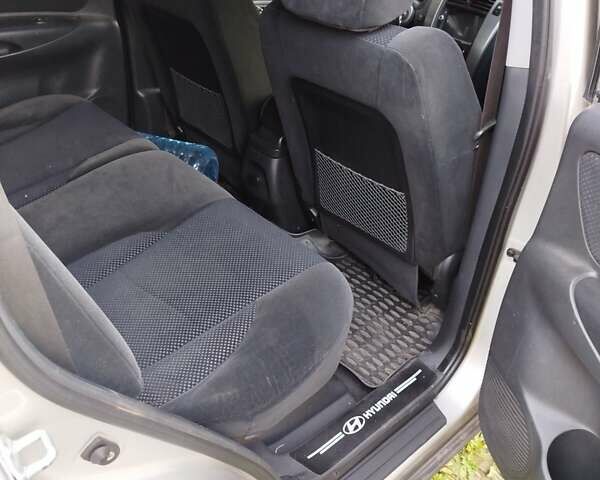 Хендай Туксон, объемом двигателя 2 л и пробегом 255 тыс. км за 7950 $, фото 11 на Automoto.ua