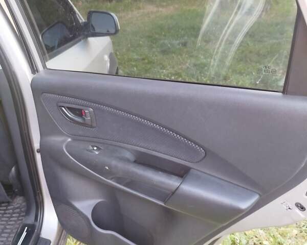 Хендай Туксон, объемом двигателя 2 л и пробегом 255 тыс. км за 7950 $, фото 12 на Automoto.ua