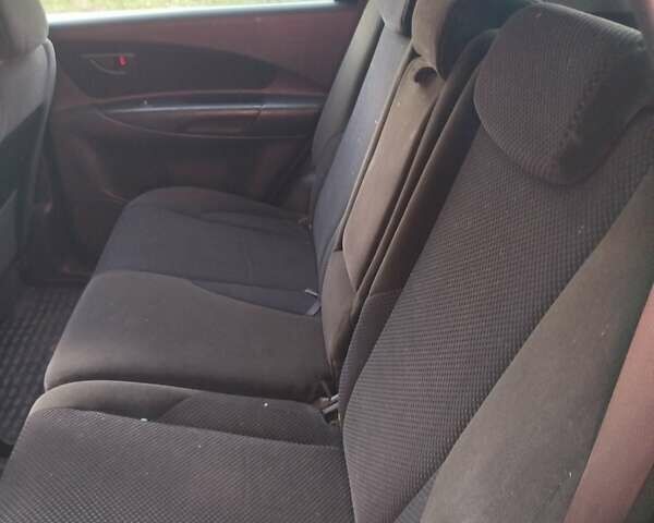 Хендай Туксон, объемом двигателя 2 л и пробегом 255 тыс. км за 7950 $, фото 3 на Automoto.ua