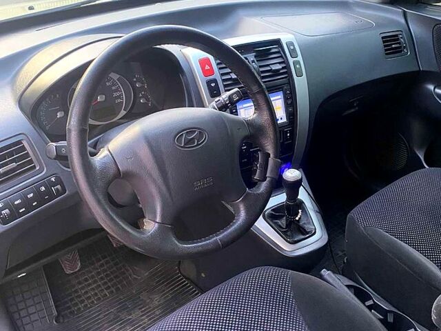 Хендай Туксон, объемом двигателя 2 л и пробегом 226 тыс. км за 7950 $, фото 7 на Automoto.ua