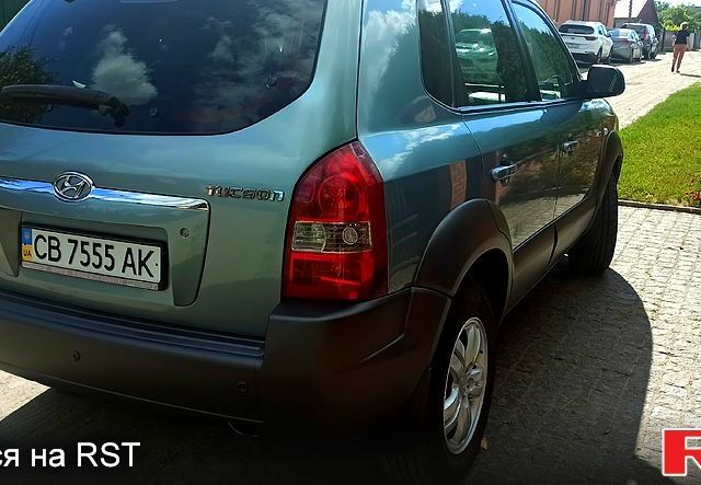 Хендай Туксон, объемом двигателя 2 л и пробегом 209 тыс. км за 8000 $, фото 3 на Automoto.ua