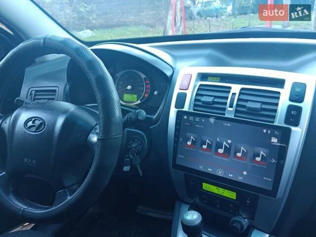 Хендай Туксон, объемом двигателя 2 л и пробегом 216 тыс. км за 8200 $, фото 3 на Automoto.ua