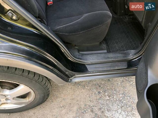 Хендай Туксон, объемом двигателя 1.98 л и пробегом 259 тыс. км за 7300 $, фото 10 на Automoto.ua