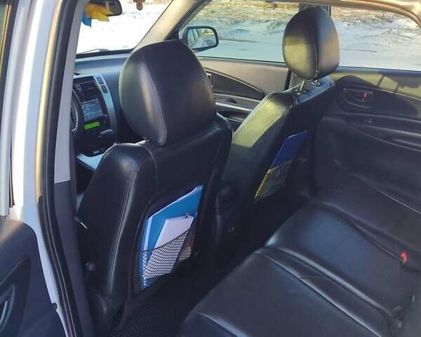 Хендай Туксон, об'ємом двигуна 2 л та пробігом 235 тис. км за 7500 $, фото 7 на Automoto.ua