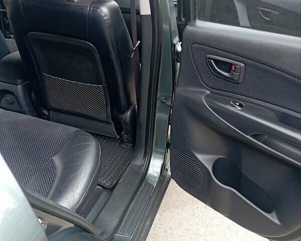 Хендай Туксон, объемом двигателя 2 л и пробегом 192 тыс. км за 9300 $, фото 10 на Automoto.ua