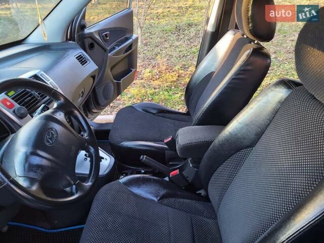 Хендай Туксон, объемом двигателя 2 л и пробегом 213 тыс. км за 10400 $, фото 78 на Automoto.ua