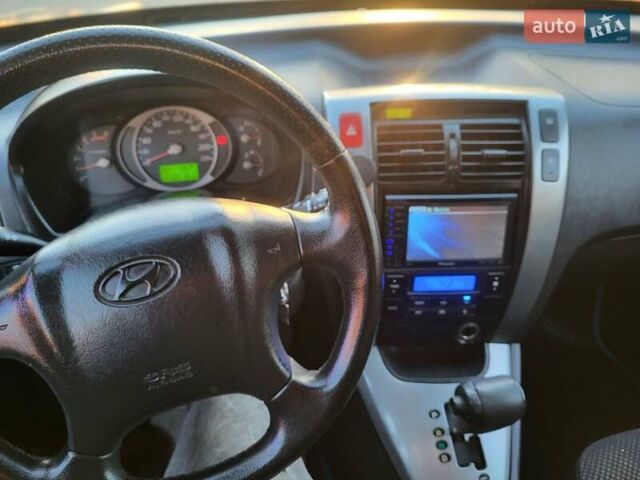 Хендай Туксон, объемом двигателя 2 л и пробегом 213 тыс. км за 10400 $, фото 105 на Automoto.ua