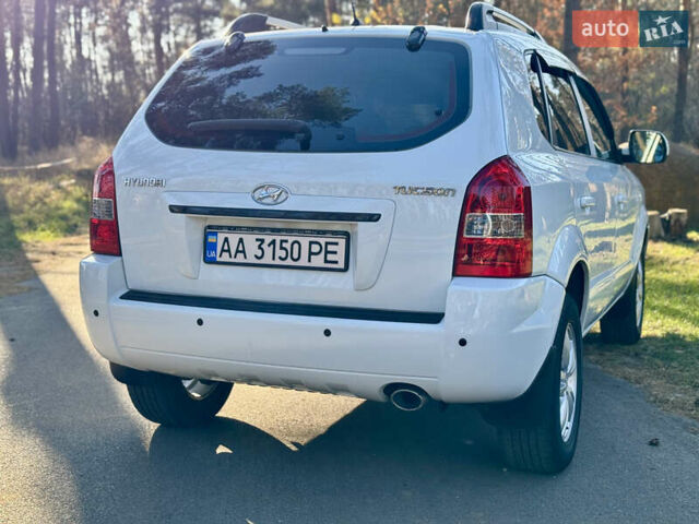 Хендай Туксон, объемом двигателя 1.98 л и пробегом 70 тыс. км за 8400 $, фото 7 на Automoto.ua