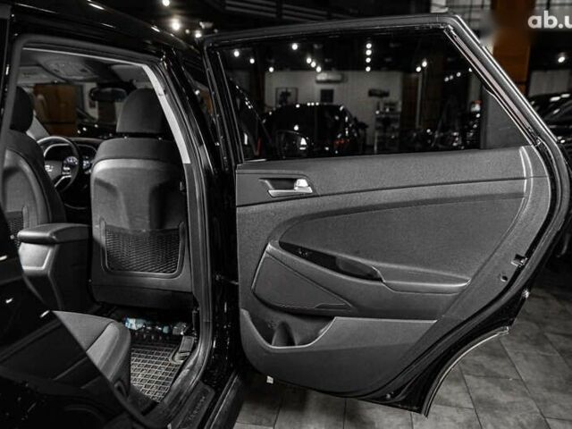 Хендай Туксон, объемом двигателя 2 л и пробегом 58 тыс. км за 17500 $, фото 26 на Automoto.ua