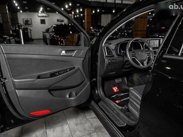 Хендай Туксон, объемом двигателя 2 л и пробегом 58 тыс. км за 17500 $, фото 11 на Automoto.ua