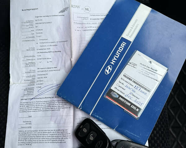 Жовтий Хендай Туксон, об'ємом двигуна 1.98 л та пробігом 192 тис. км за 6800 $, фото 15 на Automoto.ua