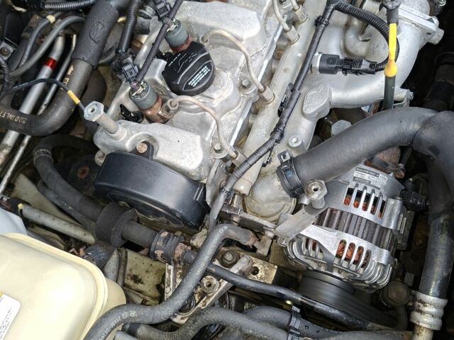 Серый Хендай Туксон, объемом двигателя 2 л и пробегом 320 тыс. км за 4200 $, фото 5 на Automoto.ua