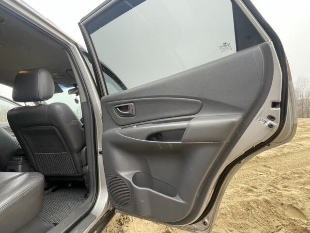 Серый Хендай Туксон, объемом двигателя 2 л и пробегом 267 тыс. км за 4300 $, фото 18 на Automoto.ua