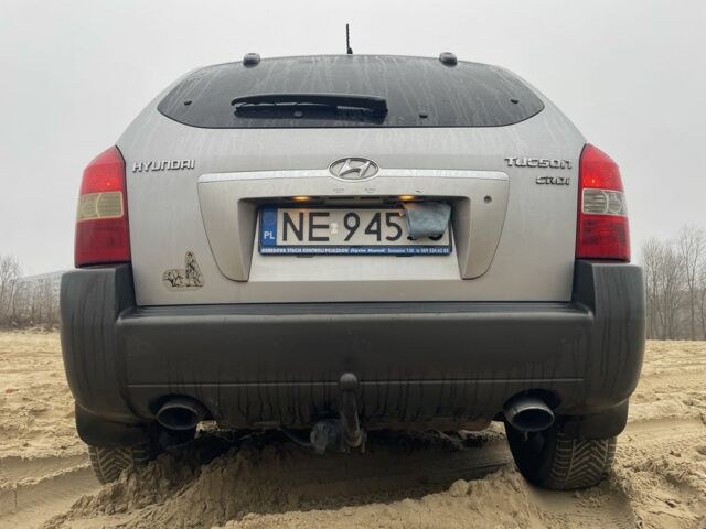 Серый Хендай Туксон, объемом двигателя 2 л и пробегом 267 тыс. км за 4300 $, фото 4 на Automoto.ua