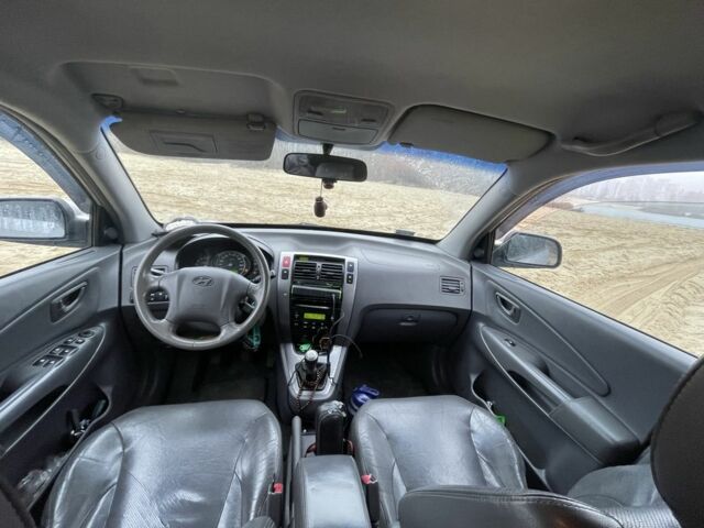 Серый Хендай Туксон, объемом двигателя 2 л и пробегом 267 тыс. км за 4300 $, фото 10 на Automoto.ua