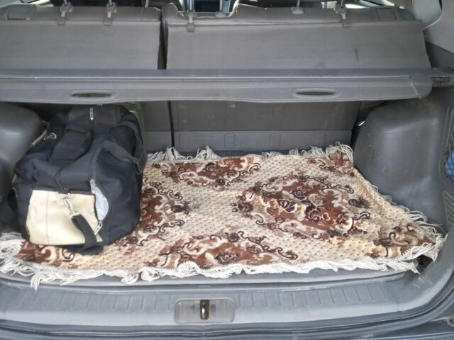 Серый Хендай Туксон, объемом двигателя 2 л и пробегом 207 тыс. км за 7500 $, фото 7 на Automoto.ua