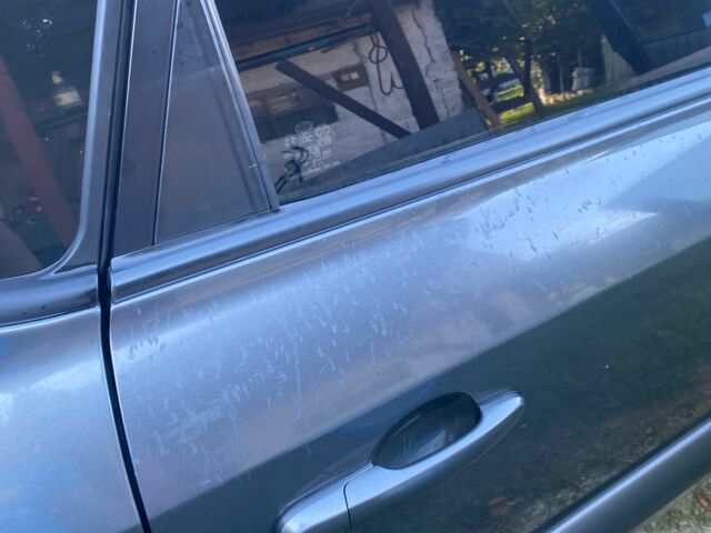 Сірий Хендай Туксон, об'ємом двигуна 2 л та пробігом 248 тис. км за 6100 $, фото 5 на Automoto.ua