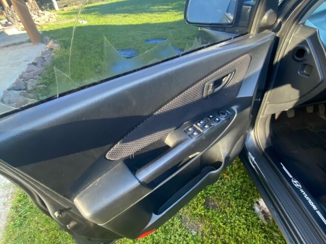 Сірий Хендай Туксон, об'ємом двигуна 2 л та пробігом 248 тис. км за 6100 $, фото 10 на Automoto.ua