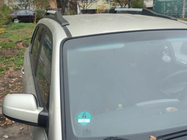 Серый Хендай Туксон, объемом двигателя 2 л и пробегом 169 тыс. км за 7500 $, фото 2 на Automoto.ua