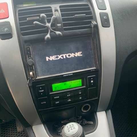 Сірий Хендай Туксон, об'ємом двигуна 2 л та пробігом 215 тис. км за 8500 $, фото 4 на Automoto.ua