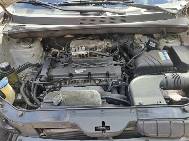 Серый Хендай Туксон, объемом двигателя 2 л и пробегом 220 тыс. км за 8800 $, фото 15 на Automoto.ua