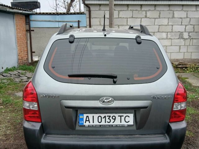 Серый Хендай Туксон, объемом двигателя 2 л и пробегом 78 тыс. км за 11600 $, фото 1 на Automoto.ua