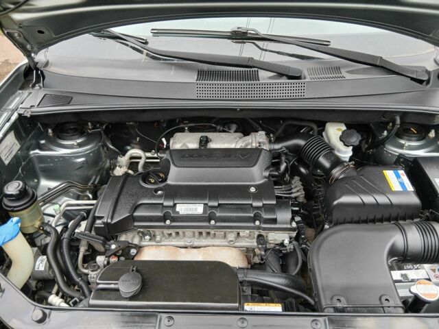 Серый Хендай Туксон, объемом двигателя 2 л и пробегом 78 тыс. км за 11600 $, фото 8 на Automoto.ua