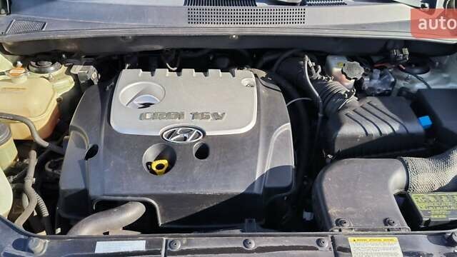 Серый Хендай Туксон, объемом двигателя 1.99 л и пробегом 275 тыс. км за 4400 $, фото 8 на Automoto.ua