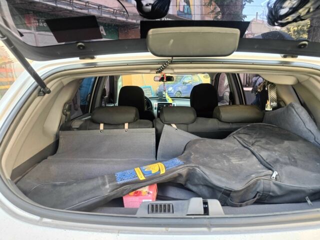Сірий Хендай Туксон, об'ємом двигуна 2 л та пробігом 3 тис. км за 4900 $, фото 5 на Automoto.ua