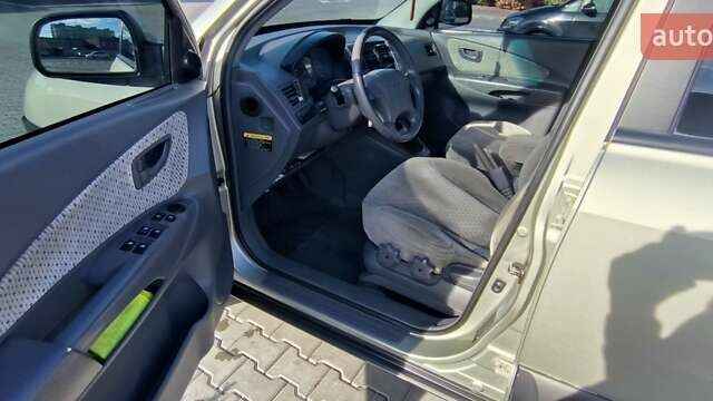 Серый Хендай Туксон, объемом двигателя 1.99 л и пробегом 275 тыс. км за 4400 $, фото 12 на Automoto.ua