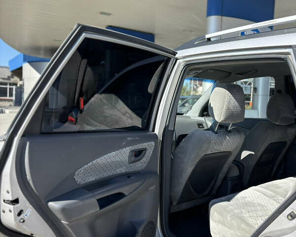 Сірий Хендай Туксон, об'ємом двигуна 2 л та пробігом 230 тис. км за 5900 $, фото 19 на Automoto.ua