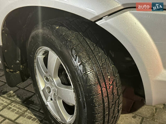 Сірий Хендай Туксон, об'ємом двигуна 2 л та пробігом 262 тис. км за 6200 $, фото 9 на Automoto.ua