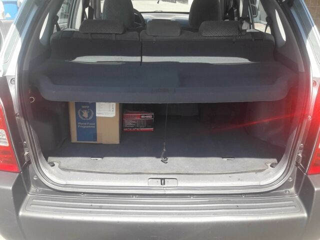 Серый Хендай Туксон, объемом двигателя 2 л и пробегом 235 тыс. км за 4600 $, фото 8 на Automoto.ua