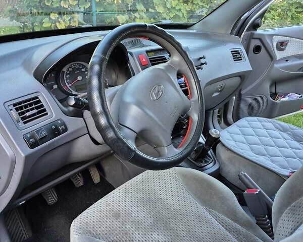 Сірий Хендай Туксон, об'ємом двигуна 1.98 л та пробігом 230 тис. км за 5500 $, фото 13 на Automoto.ua