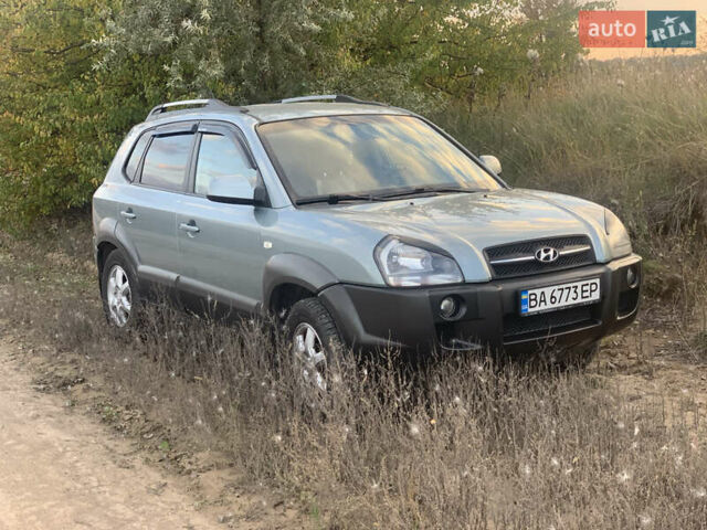 Серый Хендай Туксон, объемом двигателя 2.66 л и пробегом 297 тыс. км за 7000 $, фото 6 на Automoto.ua