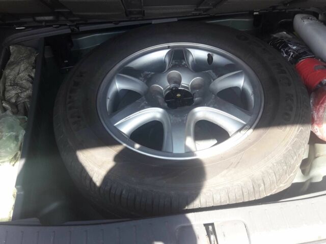 Серый Хендай Туксон, объемом двигателя 2 л и пробегом 235 тыс. км за 4600 $, фото 10 на Automoto.ua