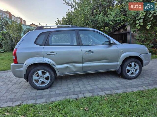 Сірий Хендай Туксон, об'ємом двигуна 1.98 л та пробігом 230 тис. км за 5500 $, фото 9 на Automoto.ua