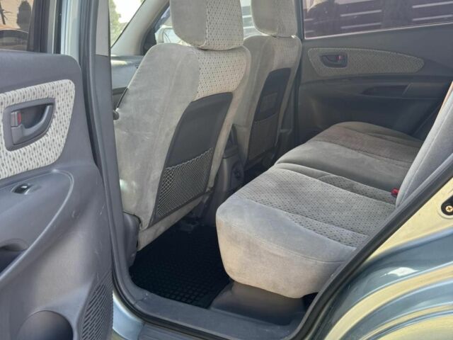 Серый Хендай Туксон, объемом двигателя 2 л и пробегом 250 тыс. км за 5200 $, фото 6 на Automoto.ua