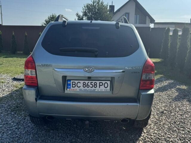 Серый Хендай Туксон, объемом двигателя 2 л и пробегом 250 тыс. км за 5200 $, фото 5 на Automoto.ua