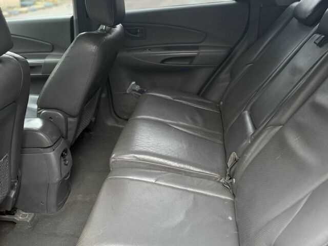 Сірий Хендай Туксон, об'ємом двигуна 2.7 л та пробігом 370 тис. км за 2900 $, фото 7 на Automoto.ua