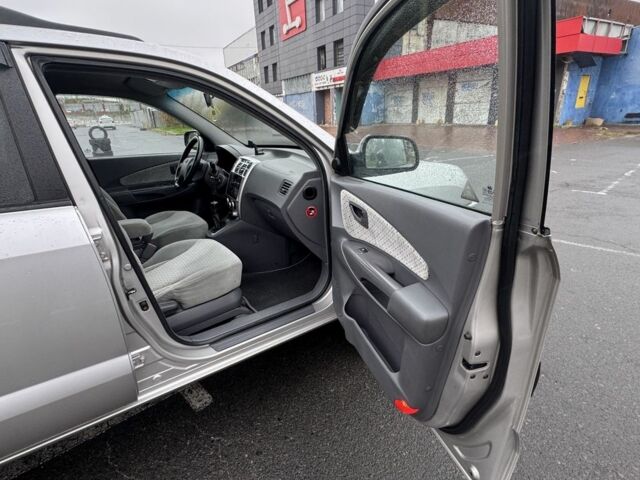 Серый Хендай Туксон, объемом двигателя 2 л и пробегом 163 тыс. км за 8350 $, фото 13 на Automoto.ua