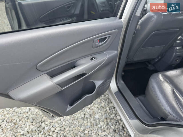 Серый Хендай Туксон, объемом двигателя 2 л и пробегом 155 тыс. км за 6989 $, фото 39 на Automoto.ua