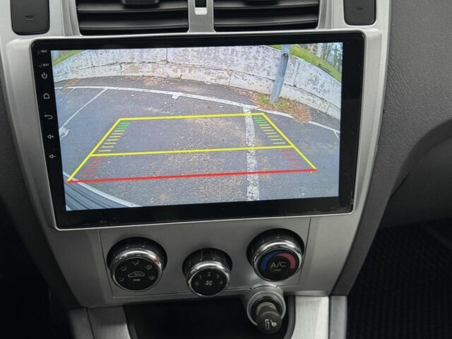 Серый Хендай Туксон, объемом двигателя 2 л и пробегом 163 тыс. км за 8350 $, фото 7 на Automoto.ua