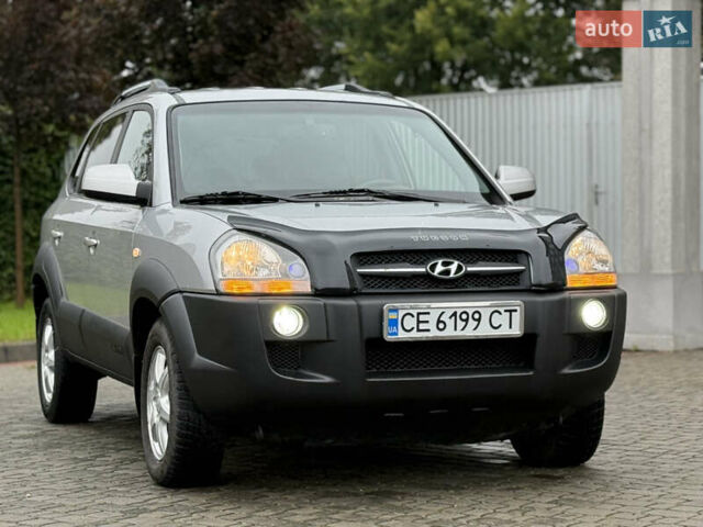 Сірий Хендай Туксон, об'ємом двигуна 1.99 л та пробігом 252 тис. км за 7700 $, фото 2 на Automoto.ua