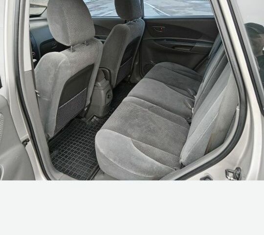 Серый Хендай Туксон, объемом двигателя 2 л и пробегом 310 тыс. км за 4200 $, фото 3 на Automoto.ua