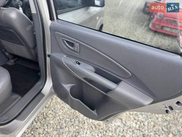 Серый Хендай Туксон, объемом двигателя 2 л и пробегом 155 тыс. км за 6989 $, фото 44 на Automoto.ua